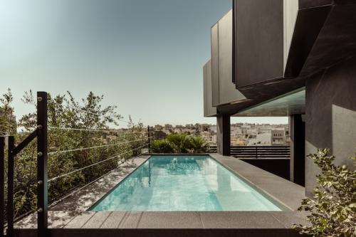 Couples’ Boutique Escape: 1-Night Stay with Breakfast, Back Massage for 2, Indoor Pool & Sauna Access + More
